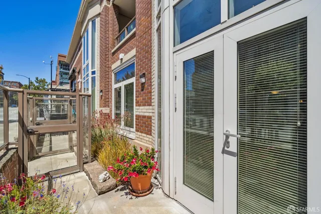 a view of a house with a potted plant