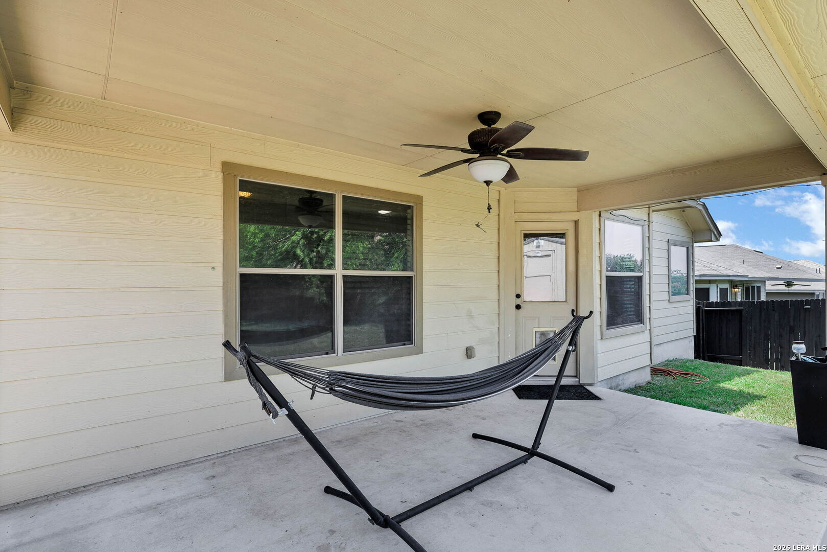 4015 Shervin Way Converse, TX 78109 - Photo 38 of 43 a living room with a table chairs and a barbeque