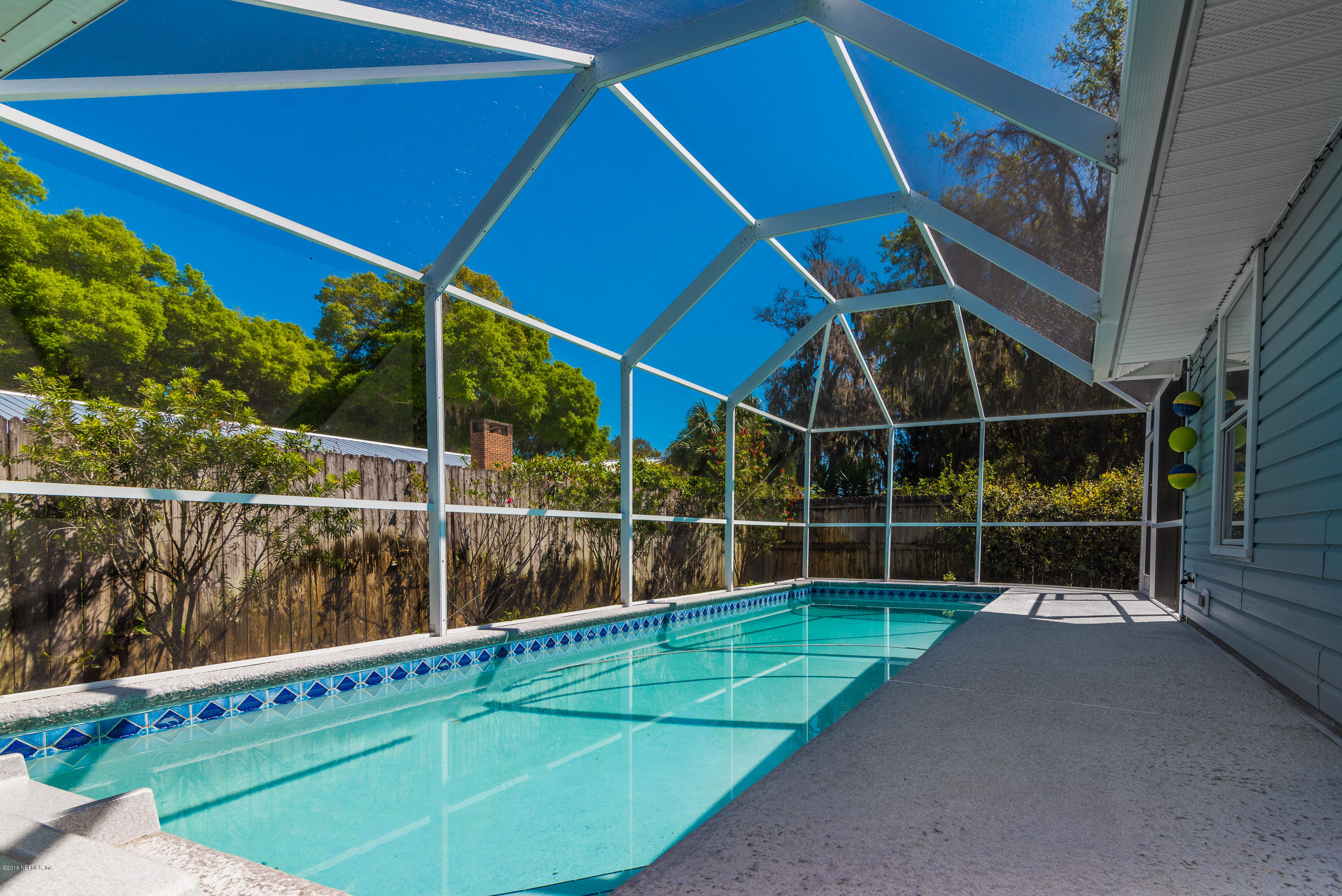 707 Warbler Road St. Augustine, FL 32086 - Photo 23 of 37 a view of a tennis court with wooden floor