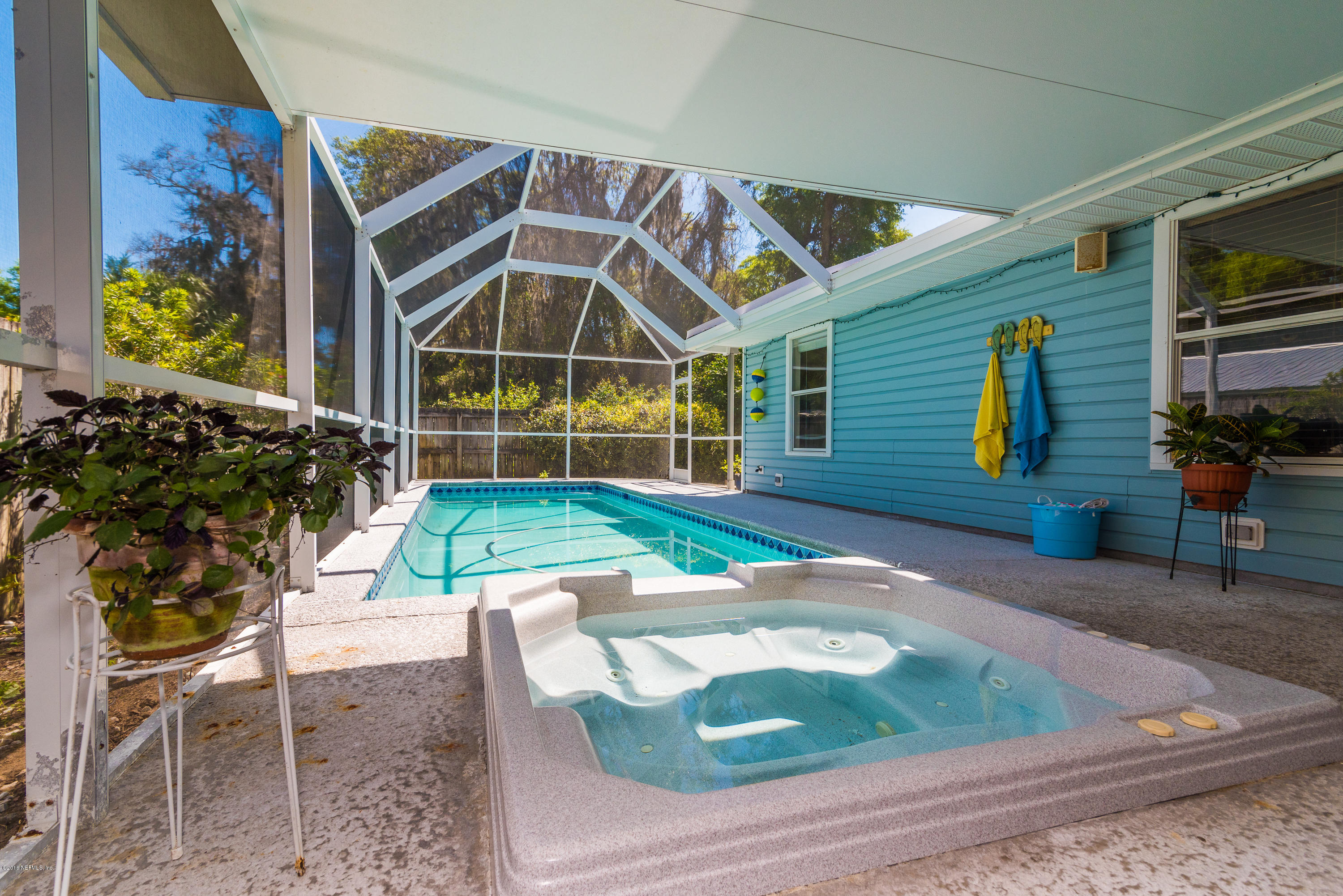 707 Warbler Road St. Augustine, FL 32086 - Photo 24 of 37 a view of a house with backyard