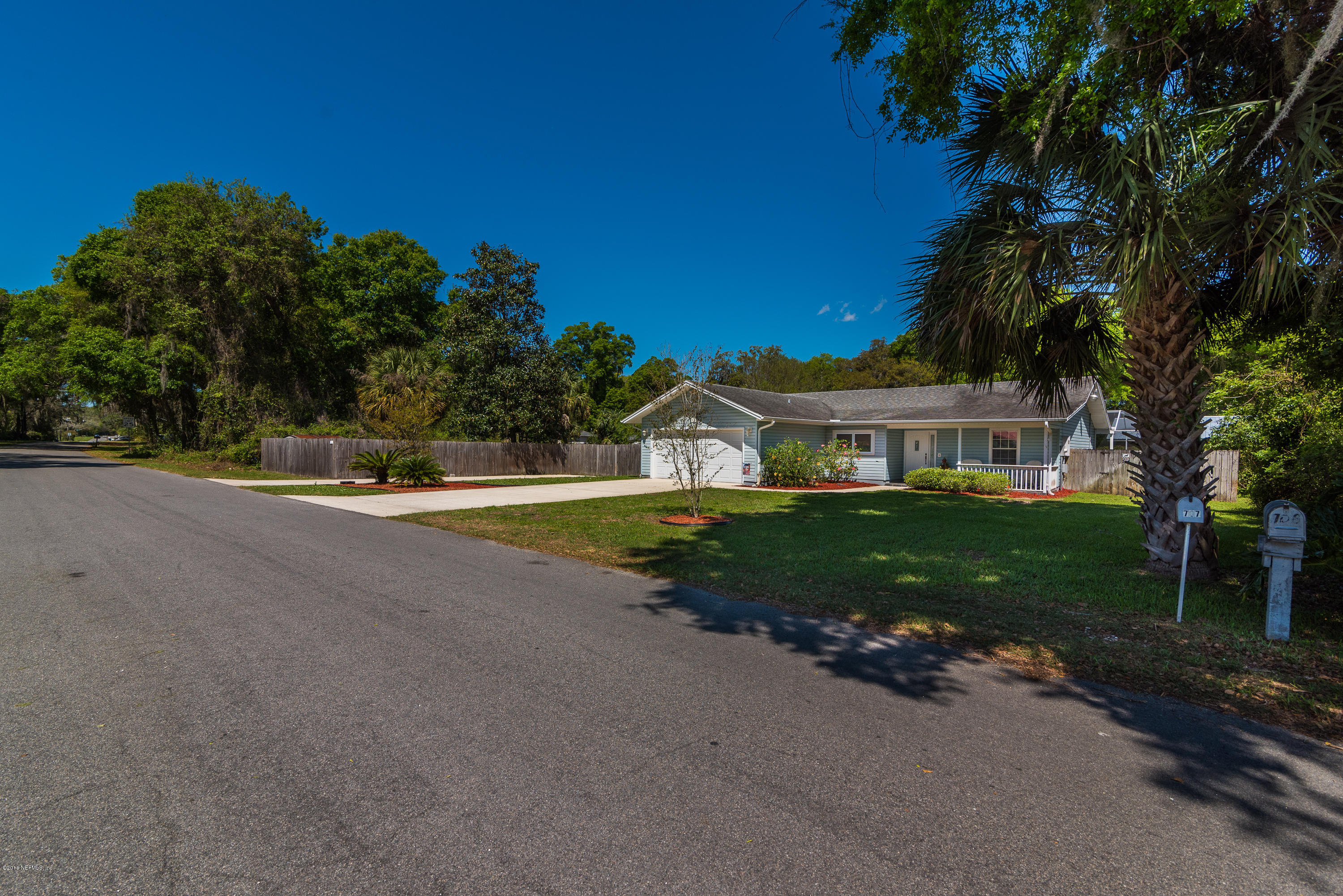 707 Warbler Road St. Augustine, FL 32086 - Photo 4 of 37 a view of a house with a big yard