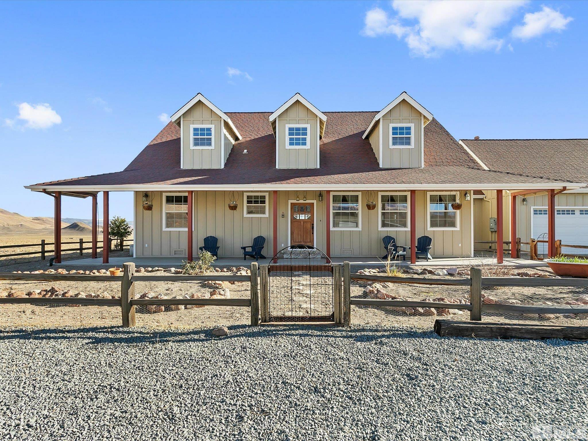 6900 Grass Valley Road Reno, NV 89510 - Photo 28 of 42 front view of a house with a yard