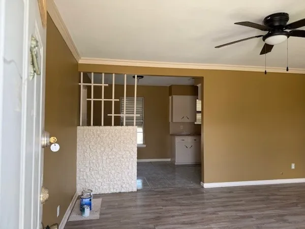a view of entryway with wooden floor