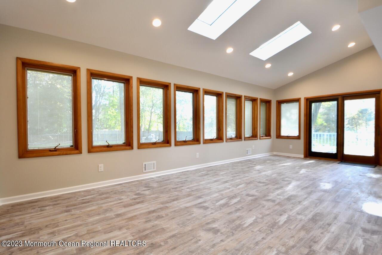 6 Wickatunk Road Manalapan, NJ 07726 - Photo 12 of 35 a view of an empty room with a window
