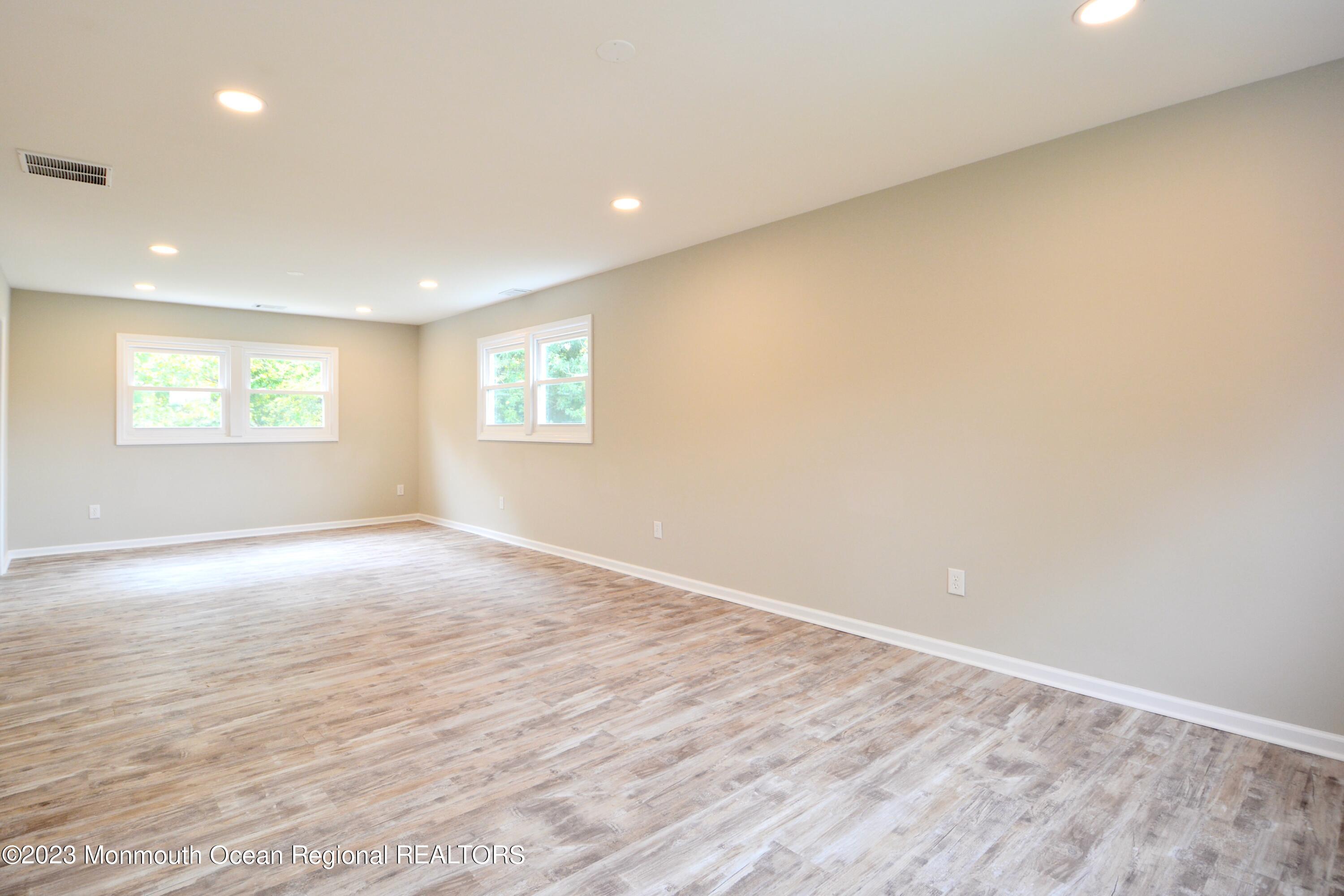 6 Wickatunk Road Manalapan, NJ 07726 - Photo 22 of 35 an empty room with a window