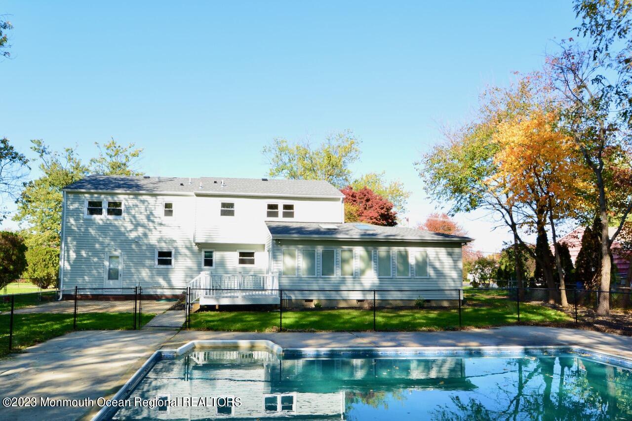 6 Wickatunk Road Manalapan, NJ 07726 - Photo 34 of 35 an aerial view of a house with garden space and street view
