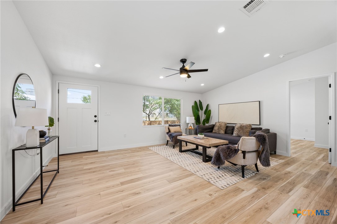 404 East Pecan Street Taylor, TX 76574 - Photo 4 of 19 a living room with furniture