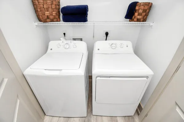 a utility room with dryer and washer