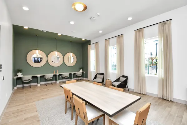 a living room with kitchen island furniture and a large window