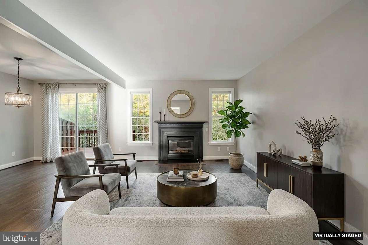 112 Federal Walk Kennett Square, PA 19348 - Photo 12 of 54 a living room with furniture and a fireplace