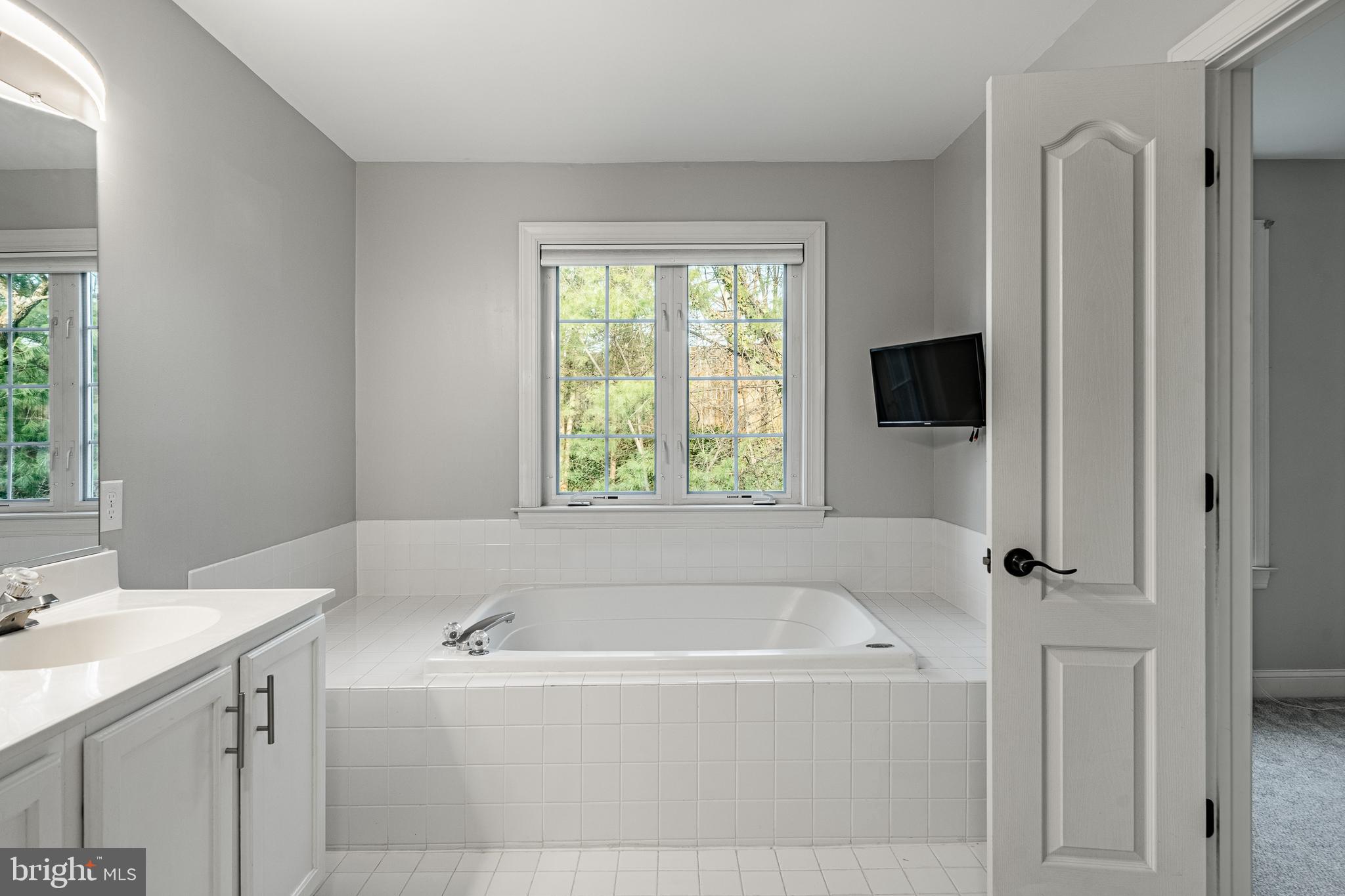 112 Federal Walk Kennett Square, PA 19348 - Photo 30 of 54 a white bath tub sitting next to a white sink