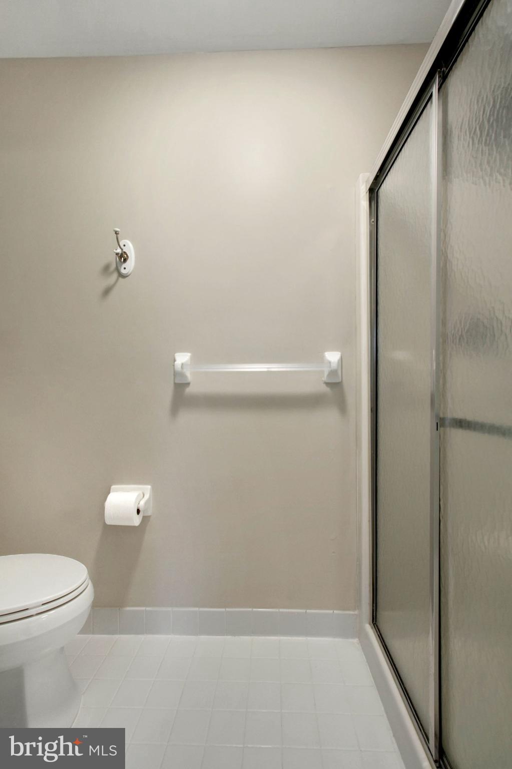 112 Federal Walk Kennett Square, PA 19348 - Photo 32 of 54 a bathroom with a toilet and a shower