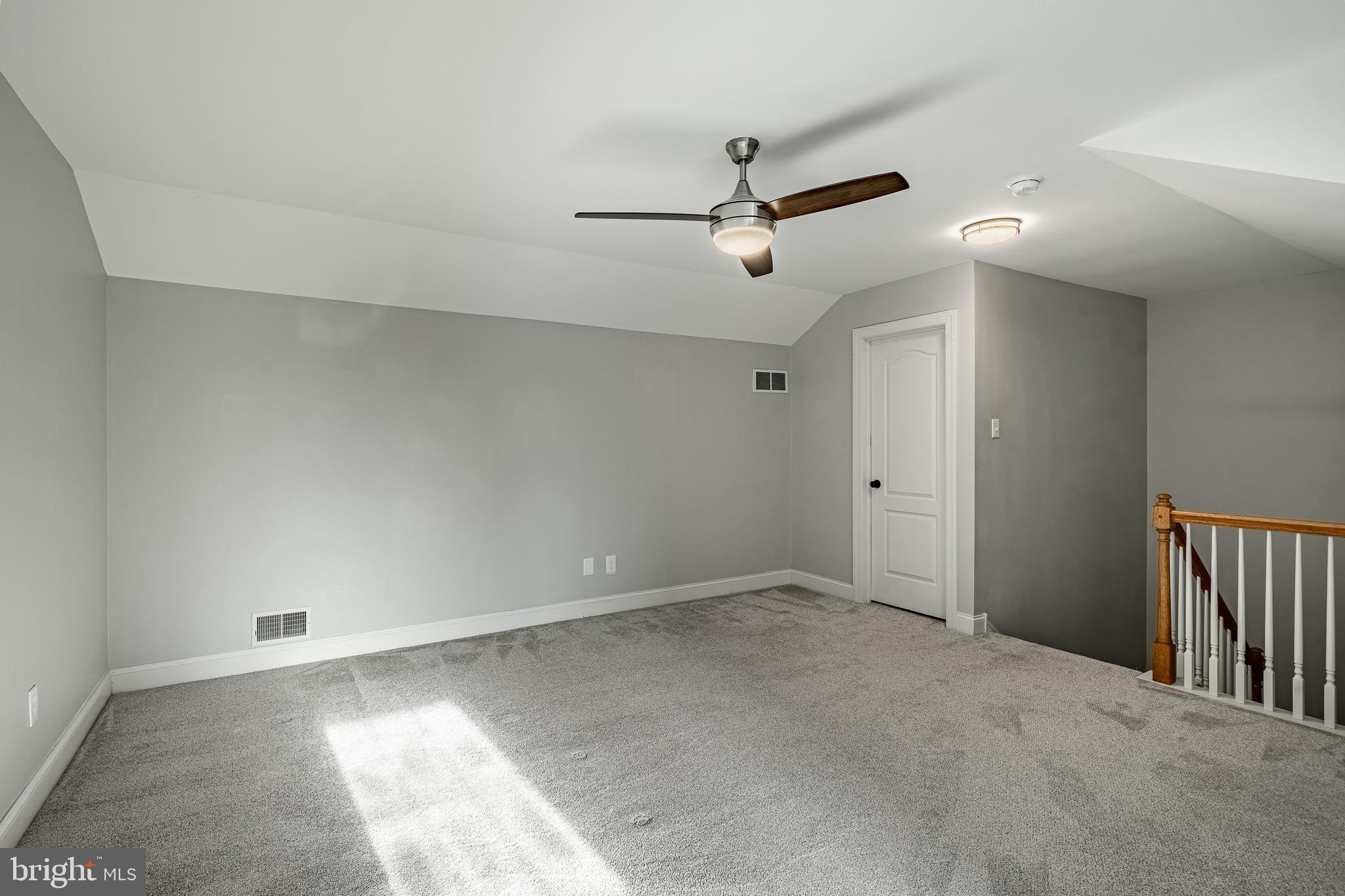 112 Federal Walk Kennett Square, PA 19348 - Photo 46 of 54 an empty room with a ceiling fan and window