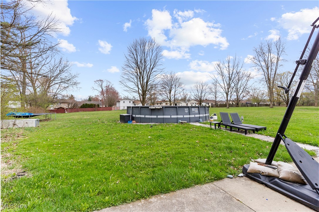 4075 Kirk Road Austintown, OH 44511 - Photo 5 of 40 View of yard featuring an outdoor pool