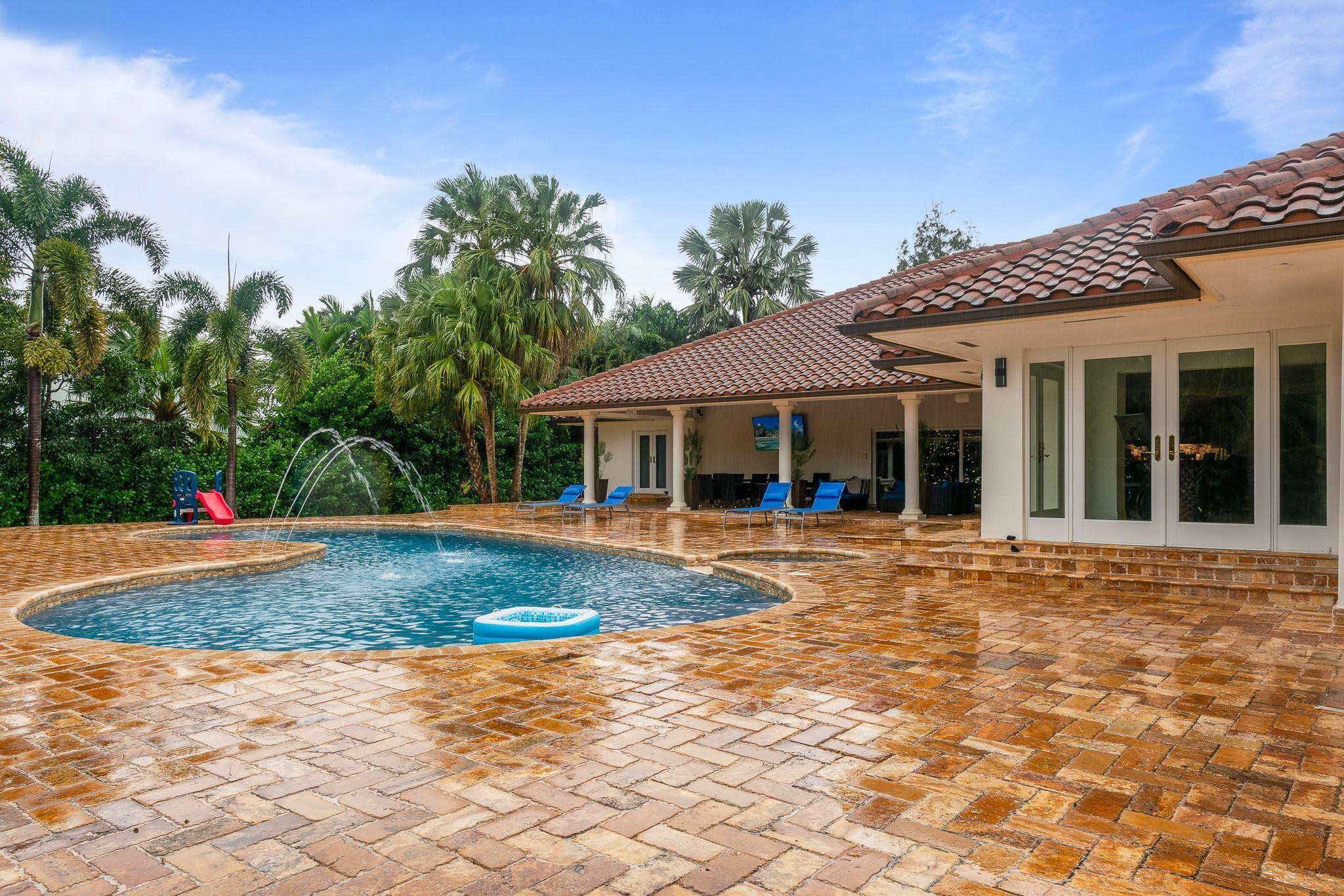 14540 Southwest 63rd Street Southwest Ranches, FL 33330 - Photo 63 of 69 a view of a house with entertaining space