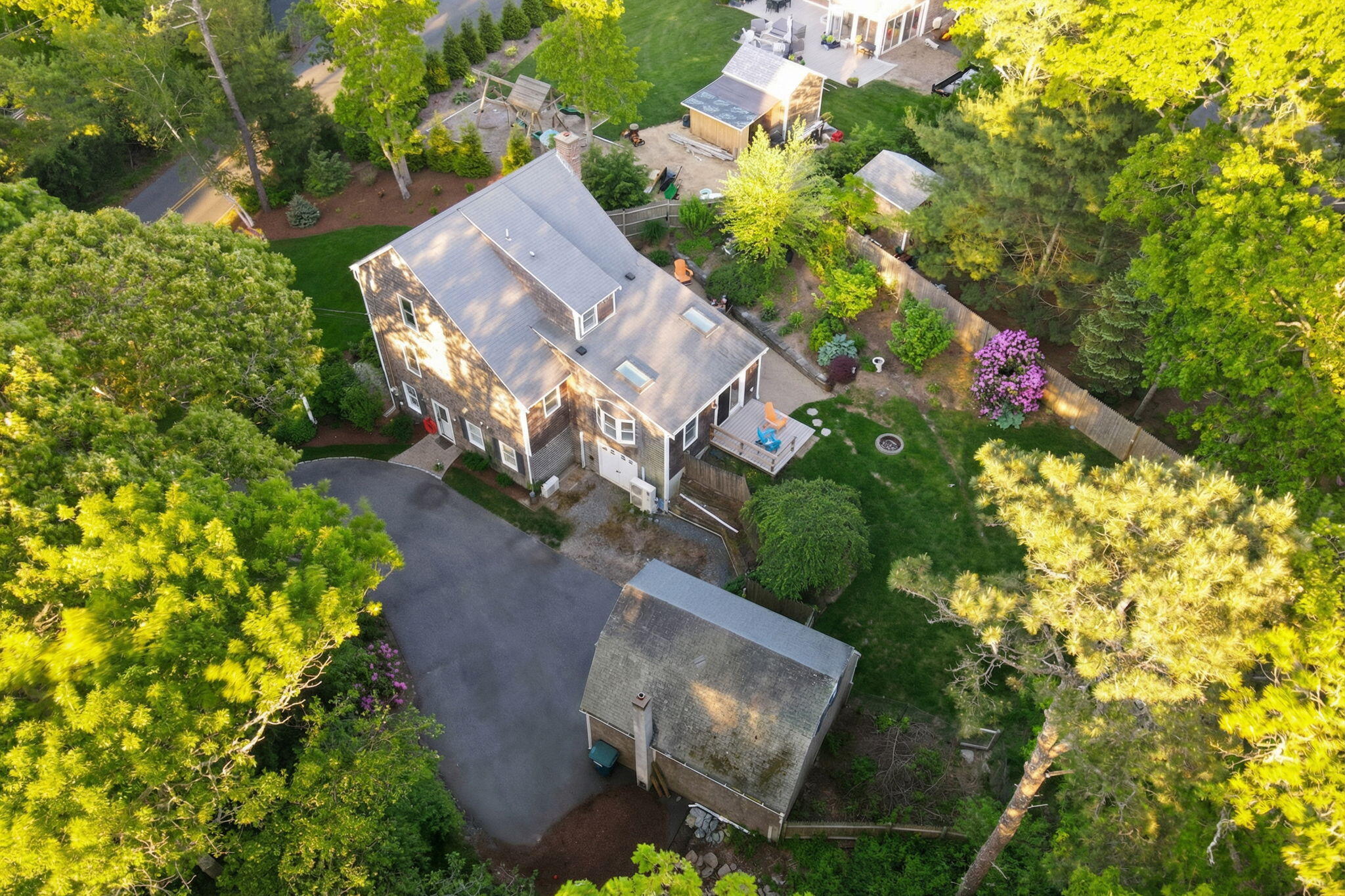 171 Weir Road Yarmouth Port, MA 02675 - Photo 2 of 53 an aerial view of a house with a yard and garden