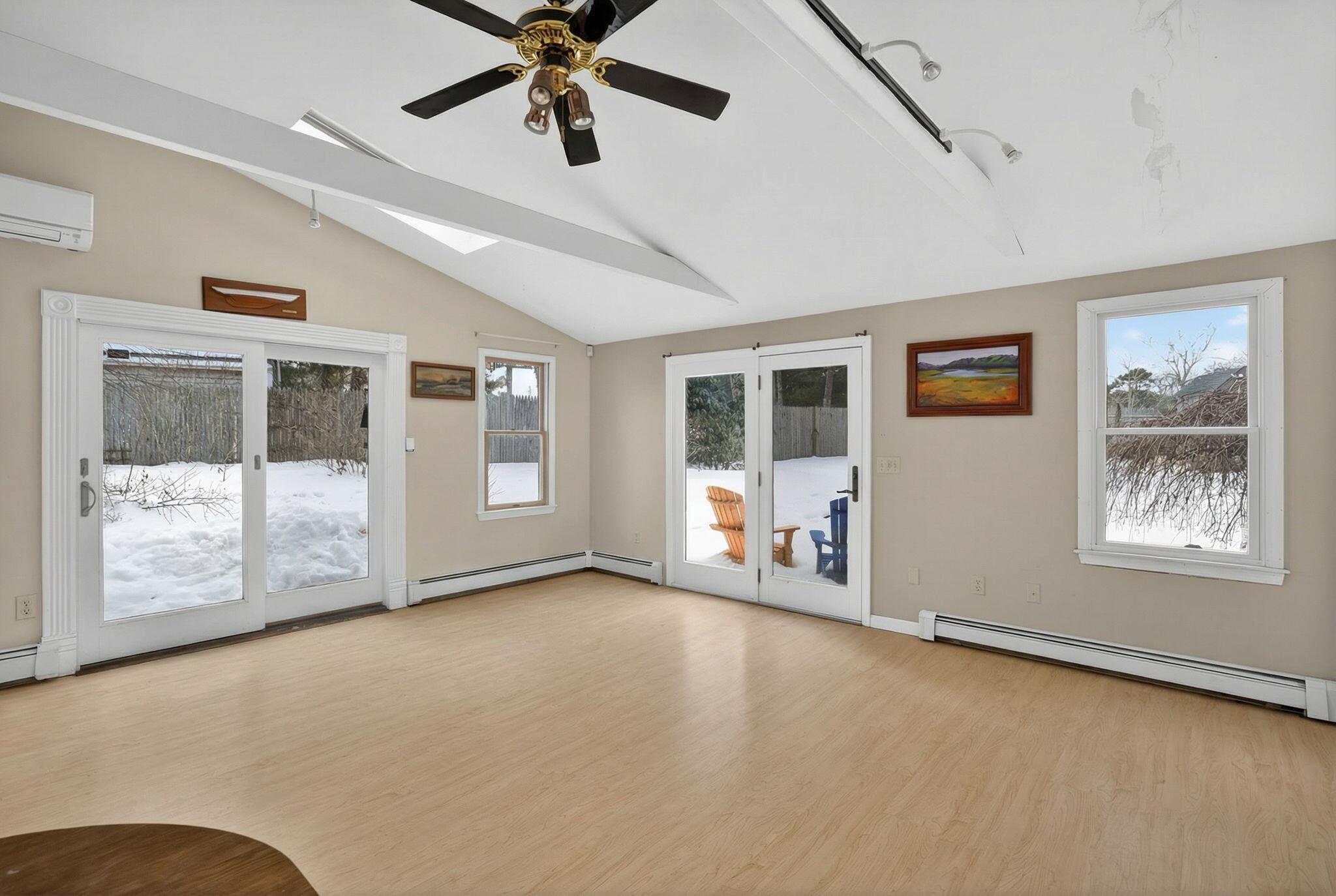 171 Weir Road Yarmouth Port, MA 02675 - Photo 28 of 53 a view of an empty room with window and cabinet