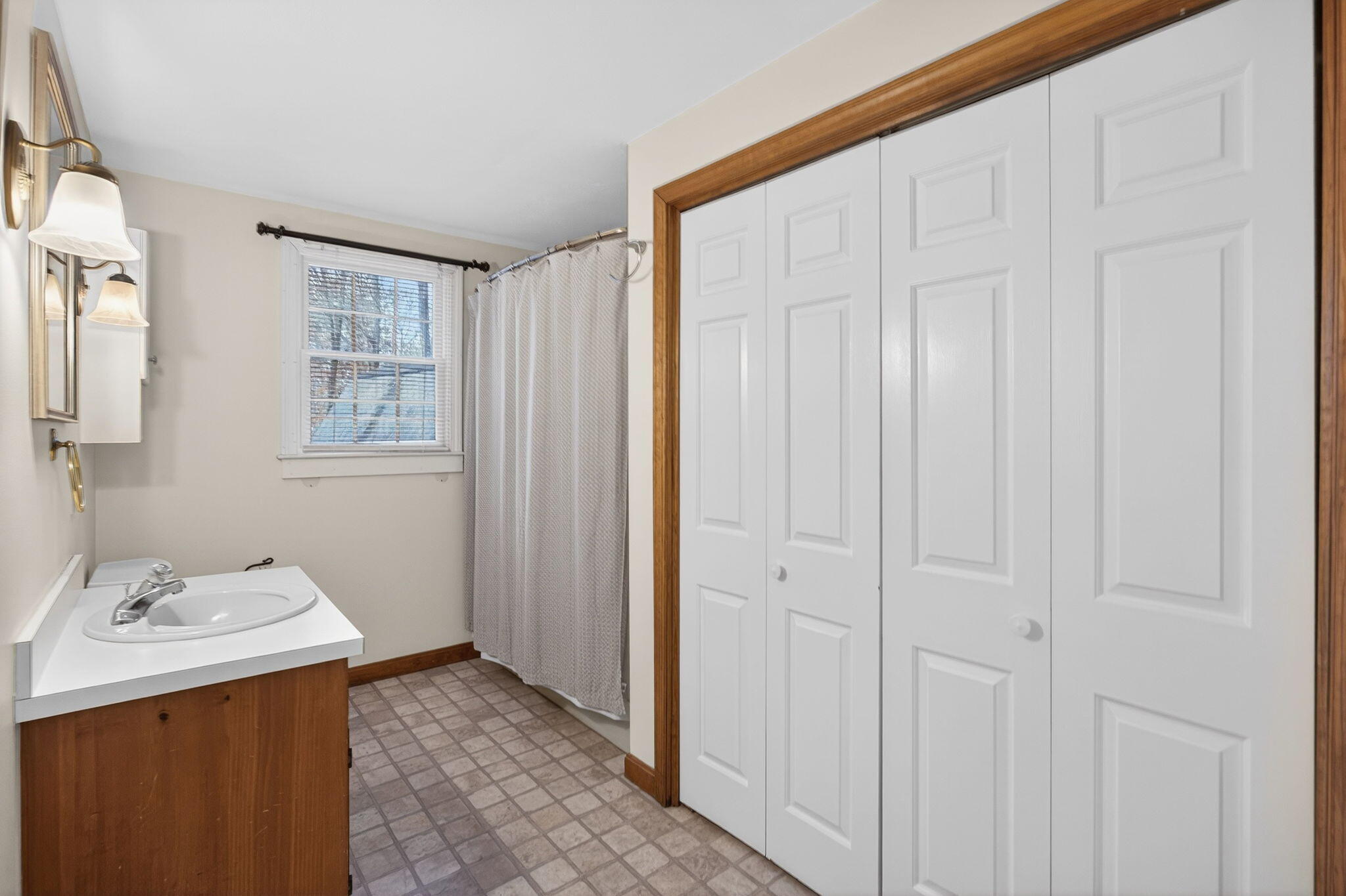 171 Weir Road Yarmouth Port, MA 02675 - Photo 33 of 53 a bathroom with a sink and a mirror