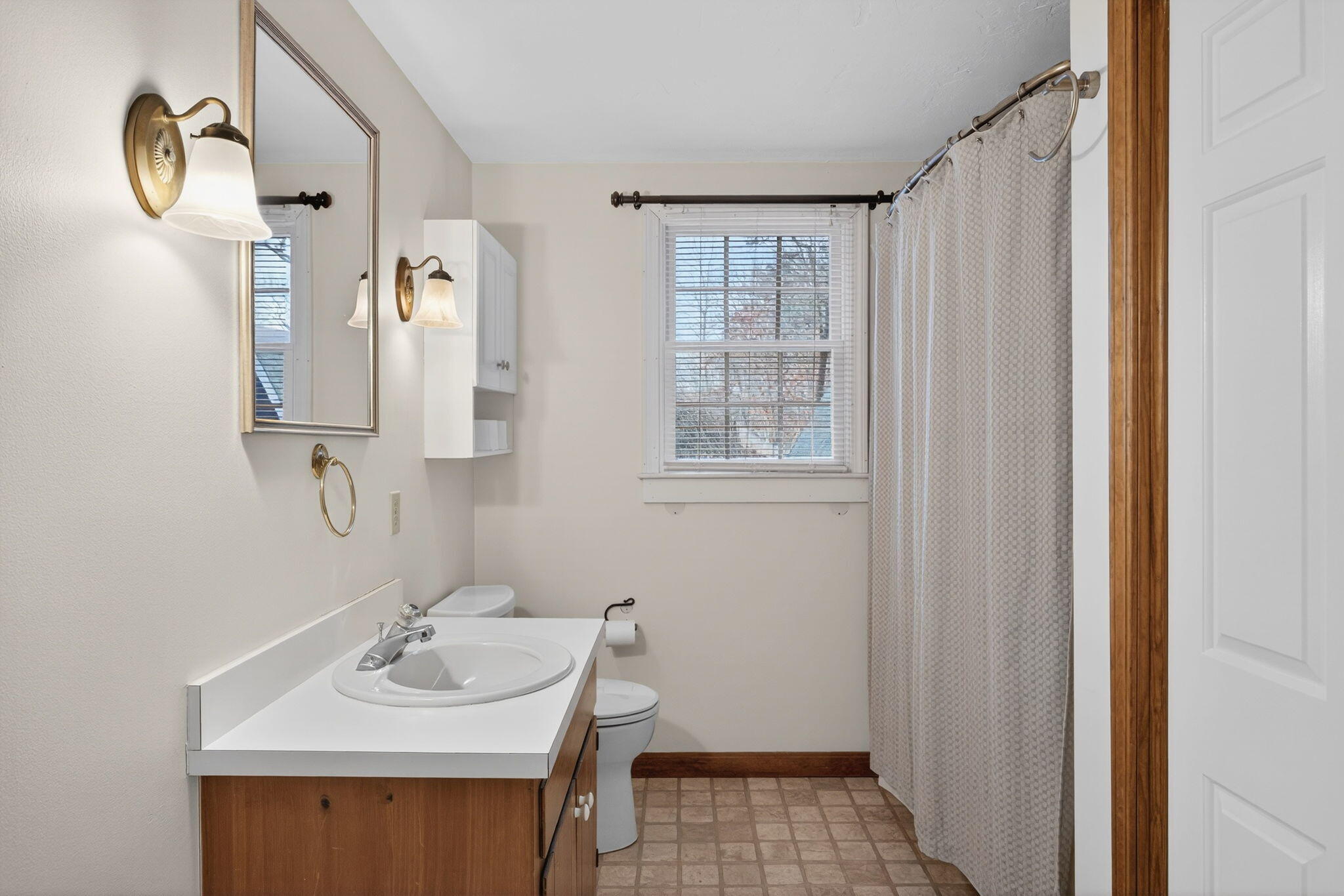 171 Weir Road Yarmouth Port, MA 02675 - Photo 35 of 53 a bathroom with a sink vanity and a mirror