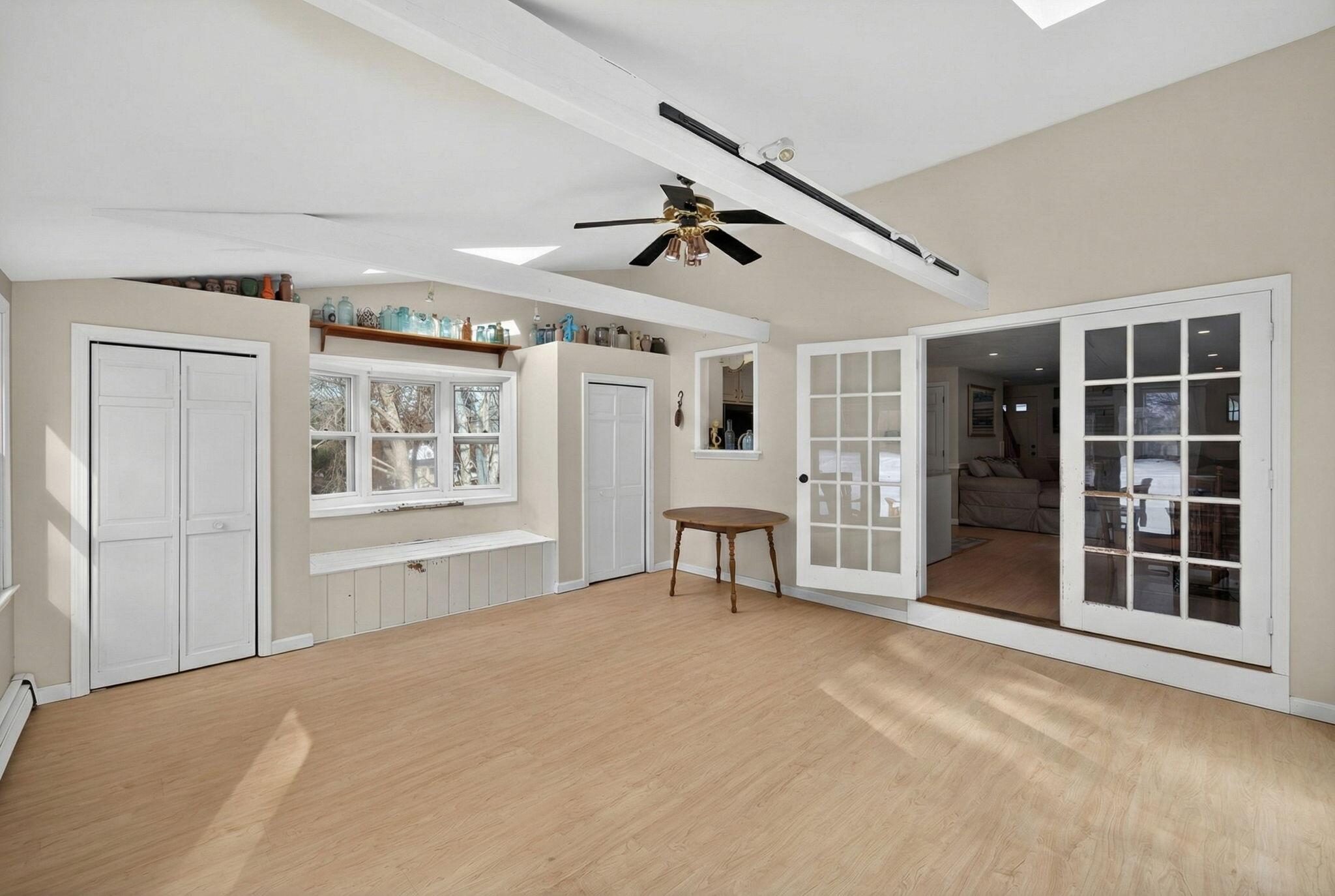 171 Weir Road Yarmouth Port, MA 02675 - Photo 39 of 53 a view of a livingroom with furniture and windows