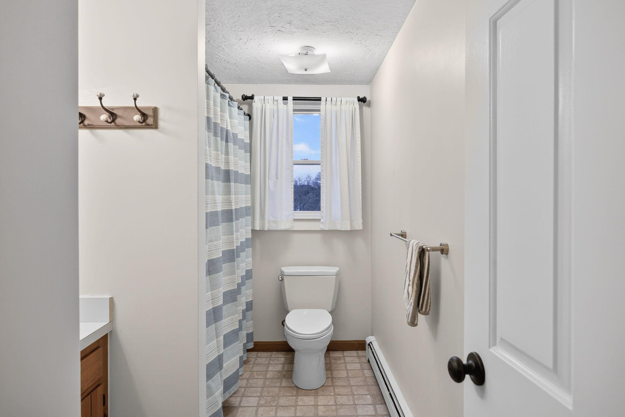 171 Weir Road Yarmouth Port, MA 02675 - Photo 43 of 53 a bathroom with a toilet and a shower