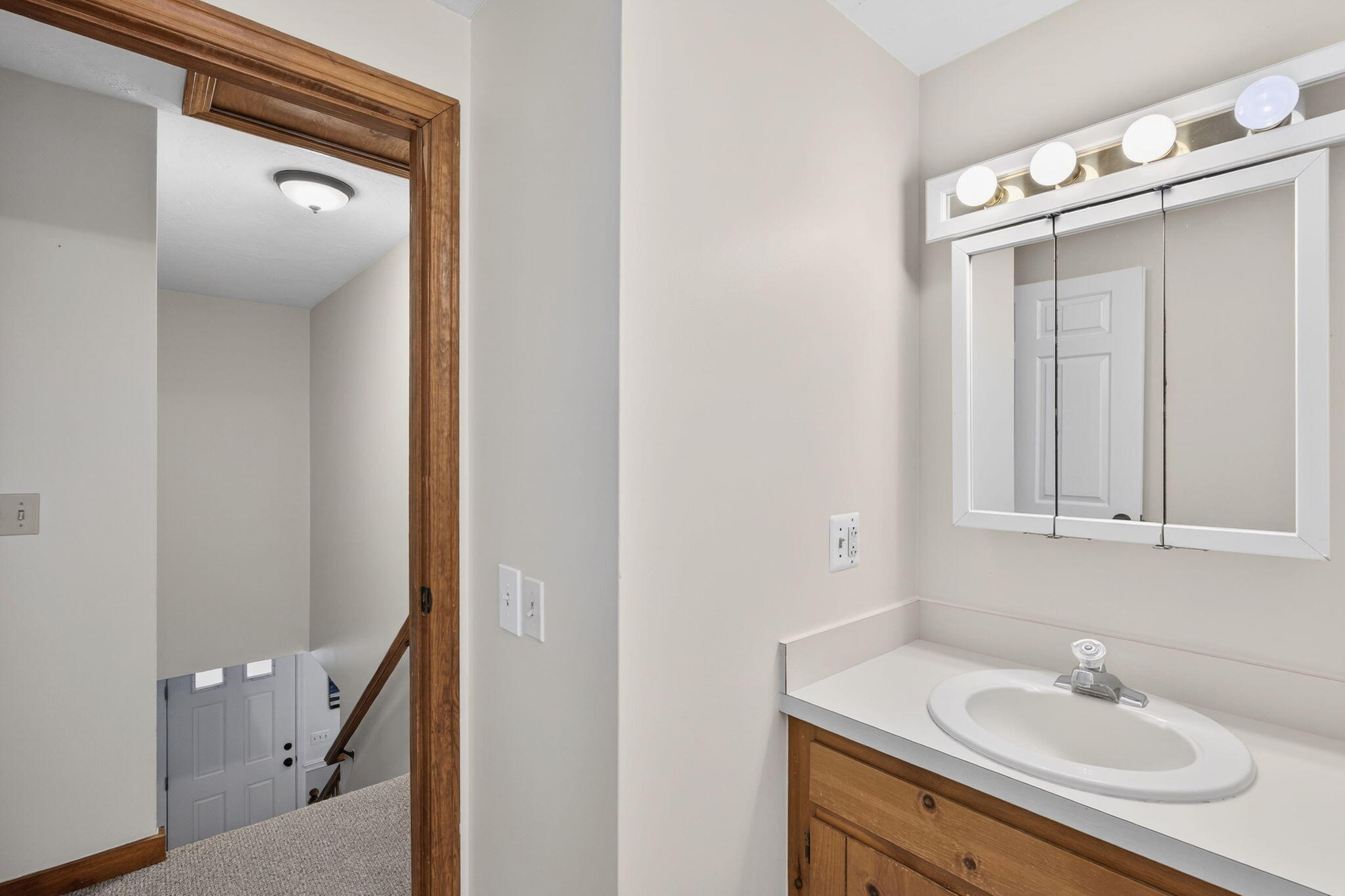 171 Weir Road Yarmouth Port, MA 02675 - Photo 44 of 53 a bathroom with a sink and mirror