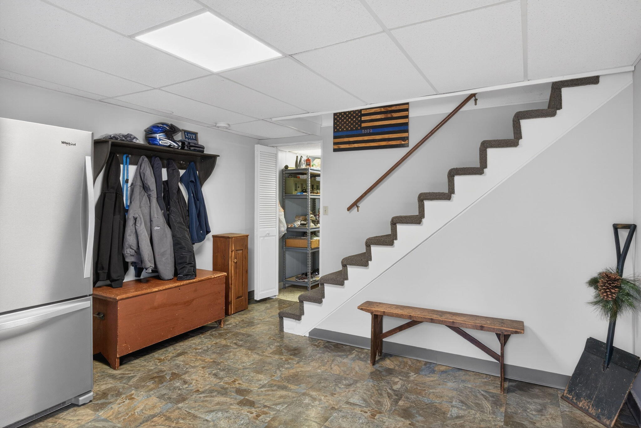171 Weir Road Yarmouth Port, MA 02675 - Photo 46 of 53 a living room with stairs