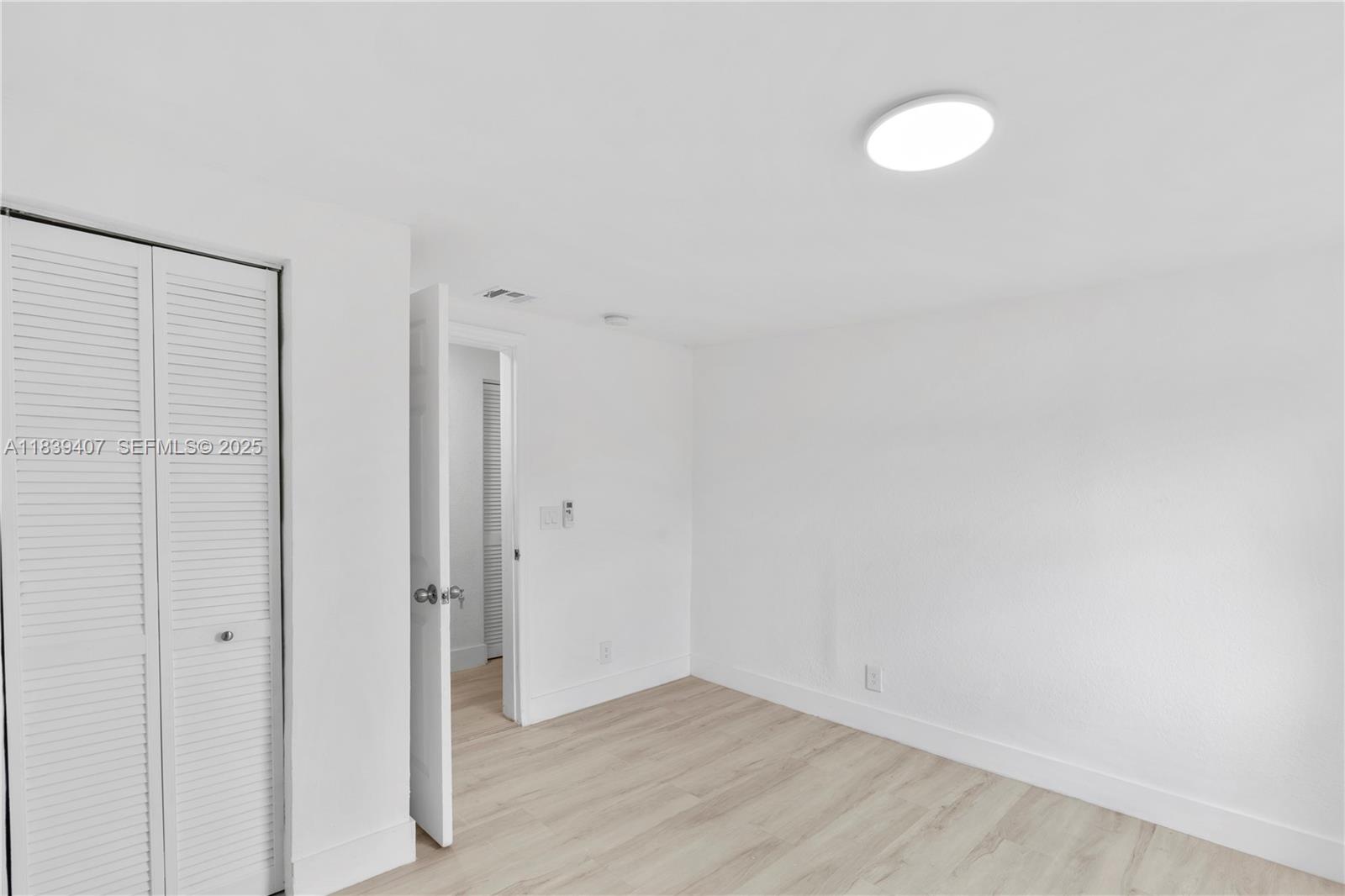 607 Southwest 3rd Street, Unit 1 Delray Beach, FL 33444 - Photo 20 of 27 a view of an empty room