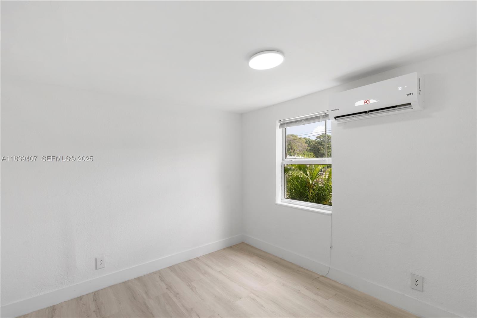 607 Southwest 3rd Street, Unit 1 Delray Beach, FL 33444 - Photo 21 of 27 a view of a window in a room