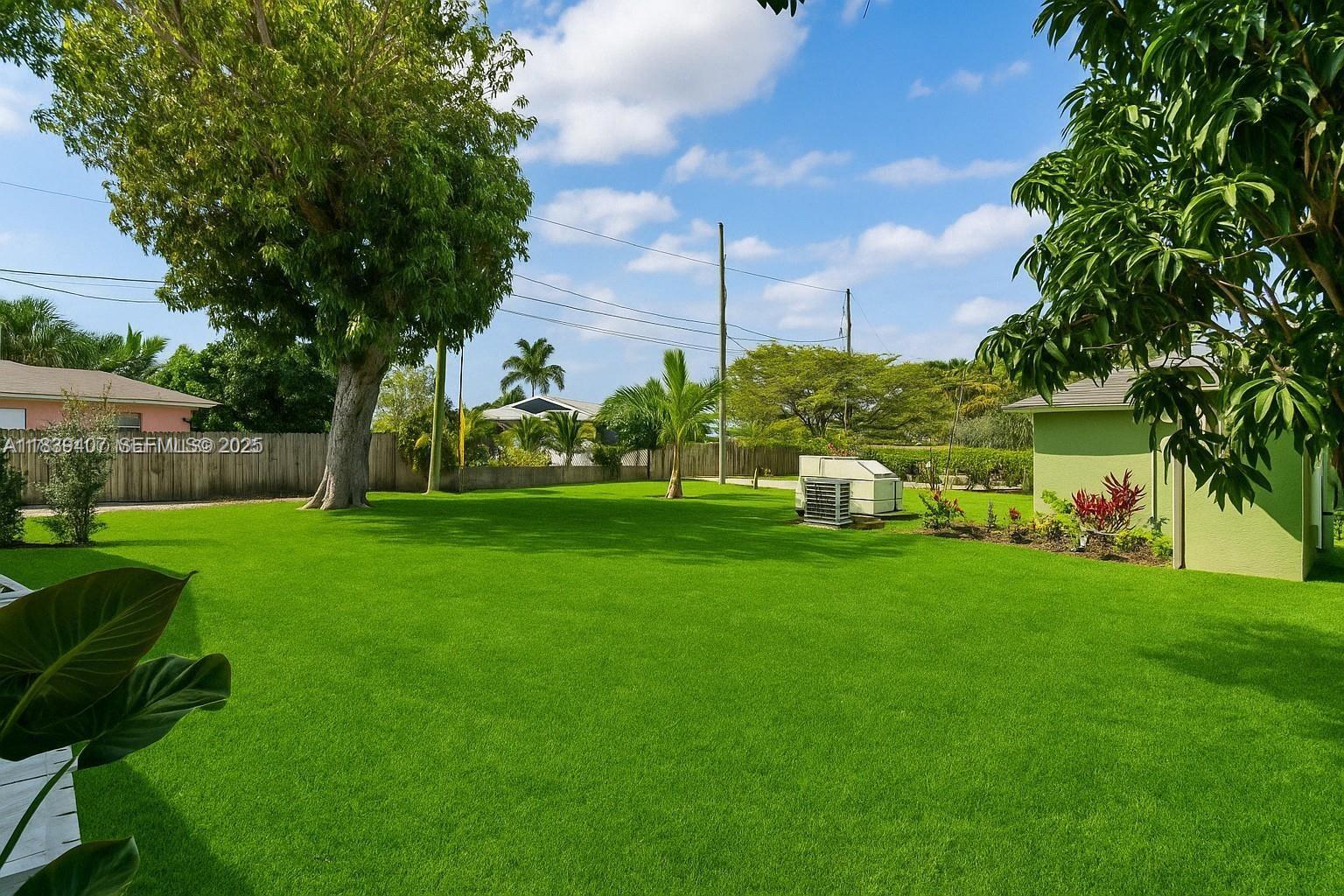 607 Southwest 3rd Street, Unit 1 Delray Beach, FL 33444 - Photo 8 of 27 a view of a park with large trees