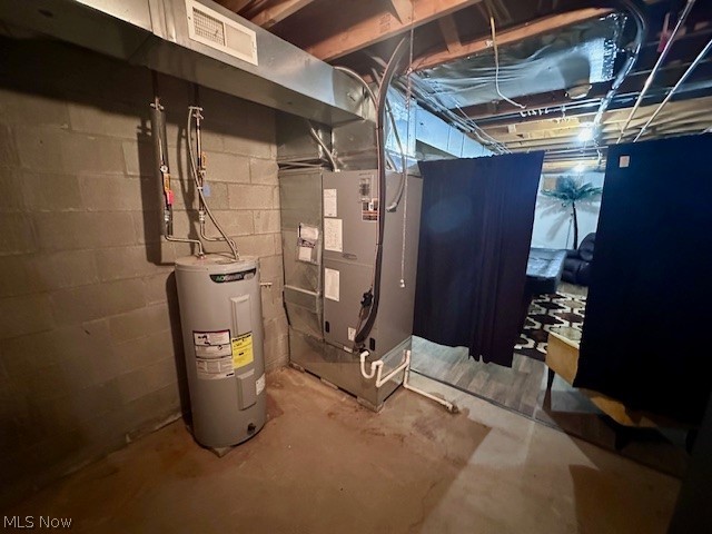 8742 Henderson Road Diamond, OH 44412 - Photo 31 of 37 Furnace, hot water tank, and heat pump new in 2024
