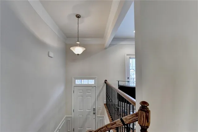 a kitchen with stainless steel appliances granite countertop a stove a refrigerator and a sink