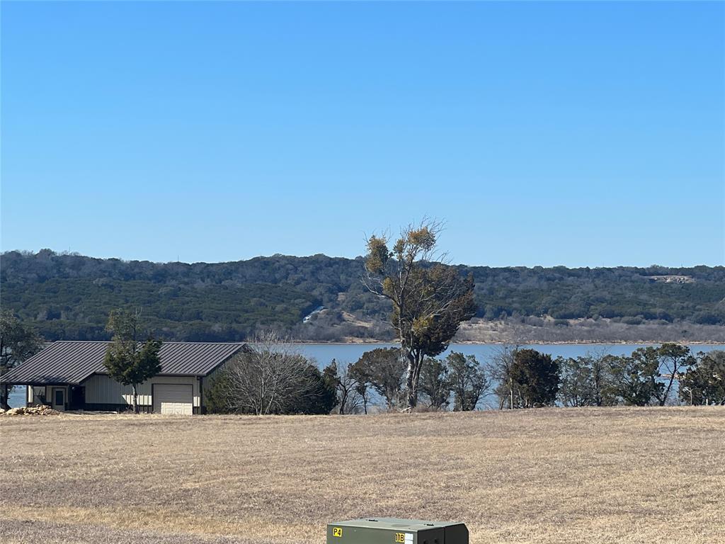 Lot 1049 Frog Branch Graford, TX 76449 - Photo 14 of 14 a view of houses with a outdoor space