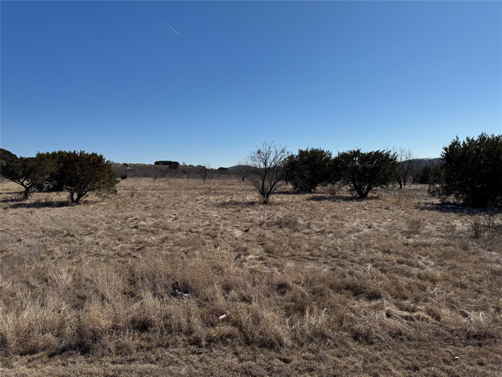 Lot 1049 Frog Branch Graford, TX 76449 - Photo 3 of 14 a view of mountain and grassy field
