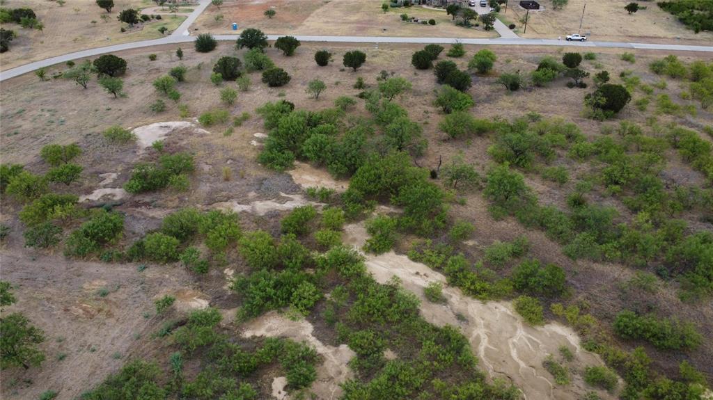 Lot 1049 Frog Branch Graford, TX 76449 - Photo 5 of 14 a view of a lush green field