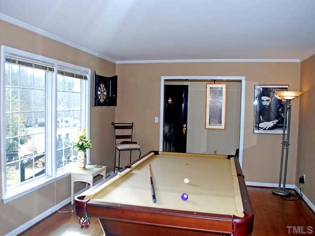 5013 Dantree Place Raleigh, NC 27609 - Photo 5 of 18 Living Room w/ Hardwoods used as "Pool Room!"