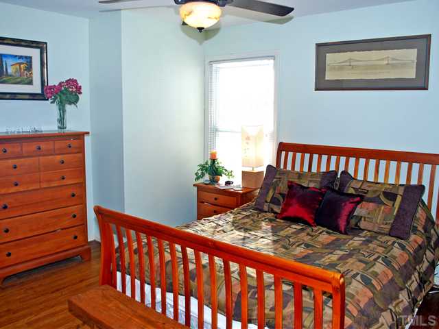 5013 Dantree Place Raleigh, NC 27609 - Photo 9 of 18 Master Suite w/ Hardwoods & Spa Bath Retreat