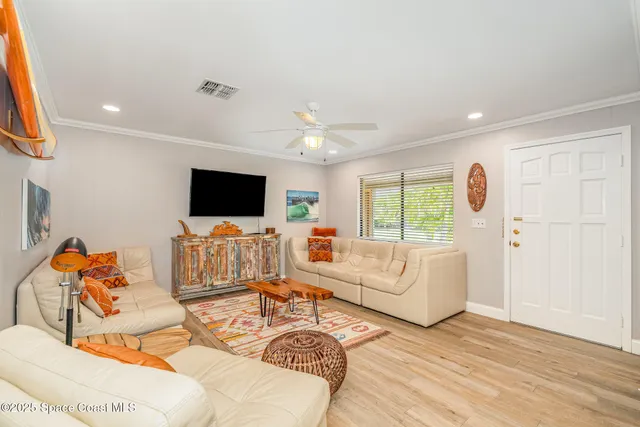 a kitchen with refrigerator and window