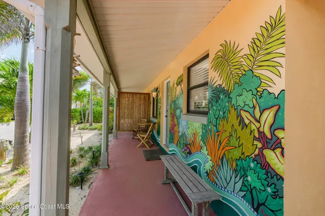 a bedroom with a bed a window and lamps