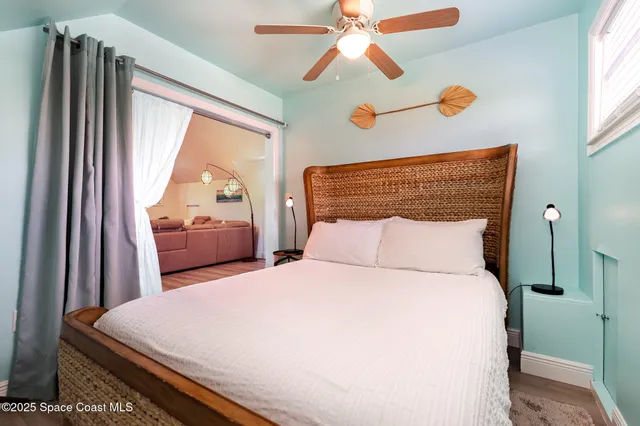 a view of a swimming pool with outdoor seating