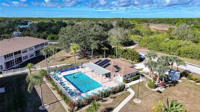 an aerial view of a house with a garden