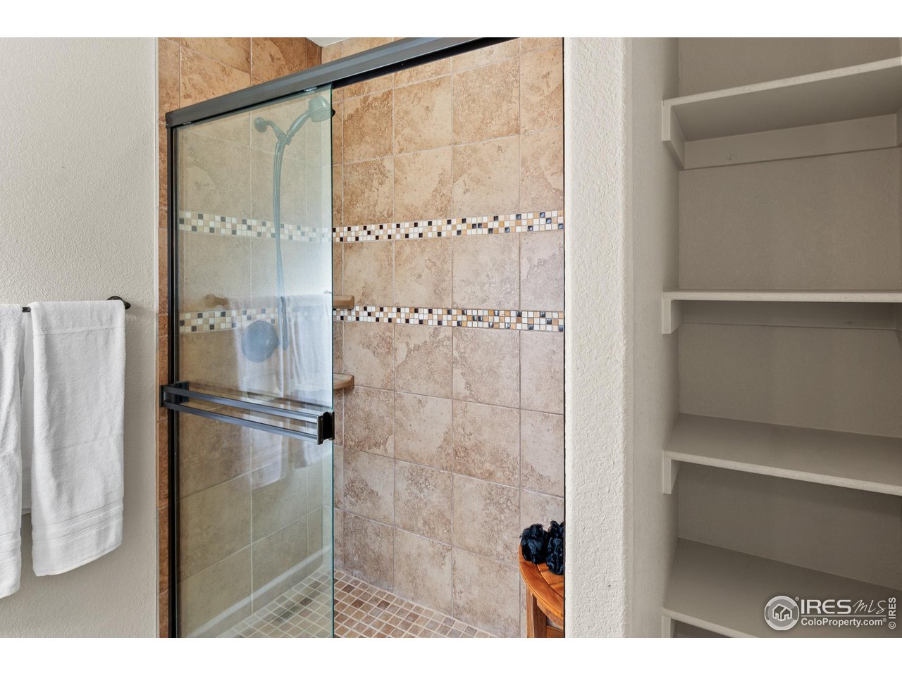 2002 Trail Ridge Drive Severance, CO 80615 - Photo 14 of 38 a bathroom with a shower