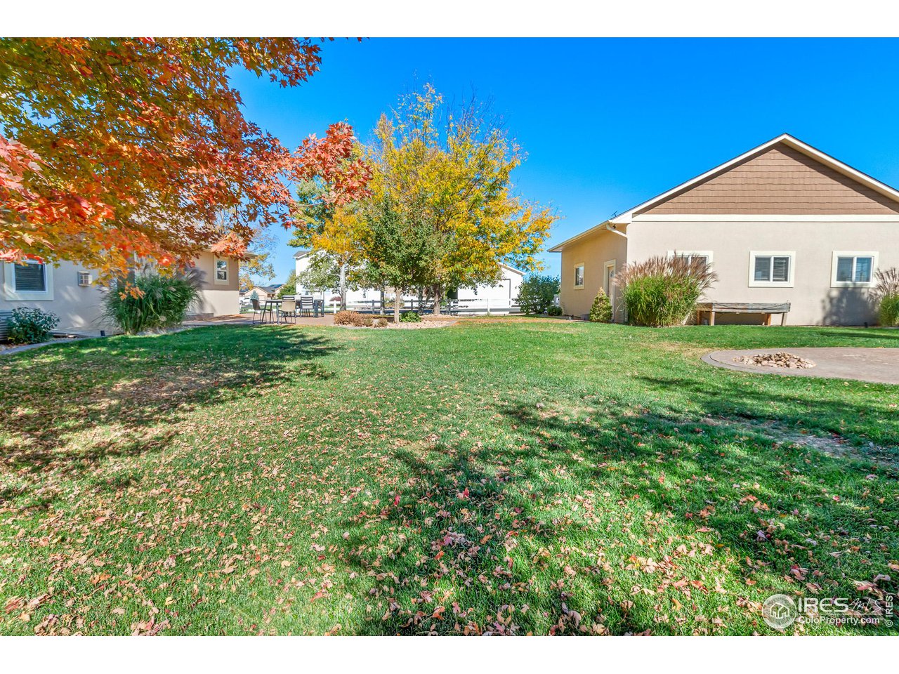 2002 Trail Ridge Drive Severance, CO 80615 - Photo 21 of 38 a front view of a house with a yard