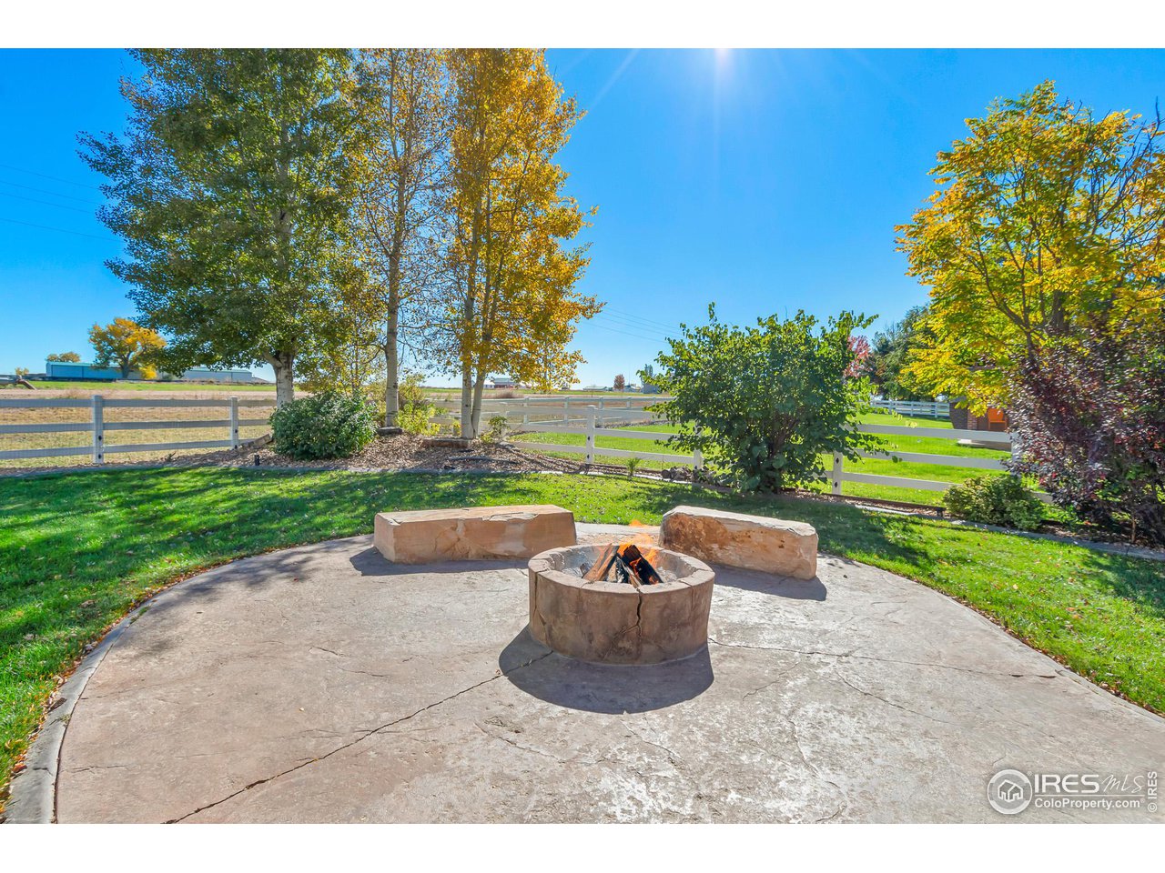 2002 Trail Ridge Drive Severance, CO 80615 - Photo 23 of 38 a view of a garden with an outdoor seating