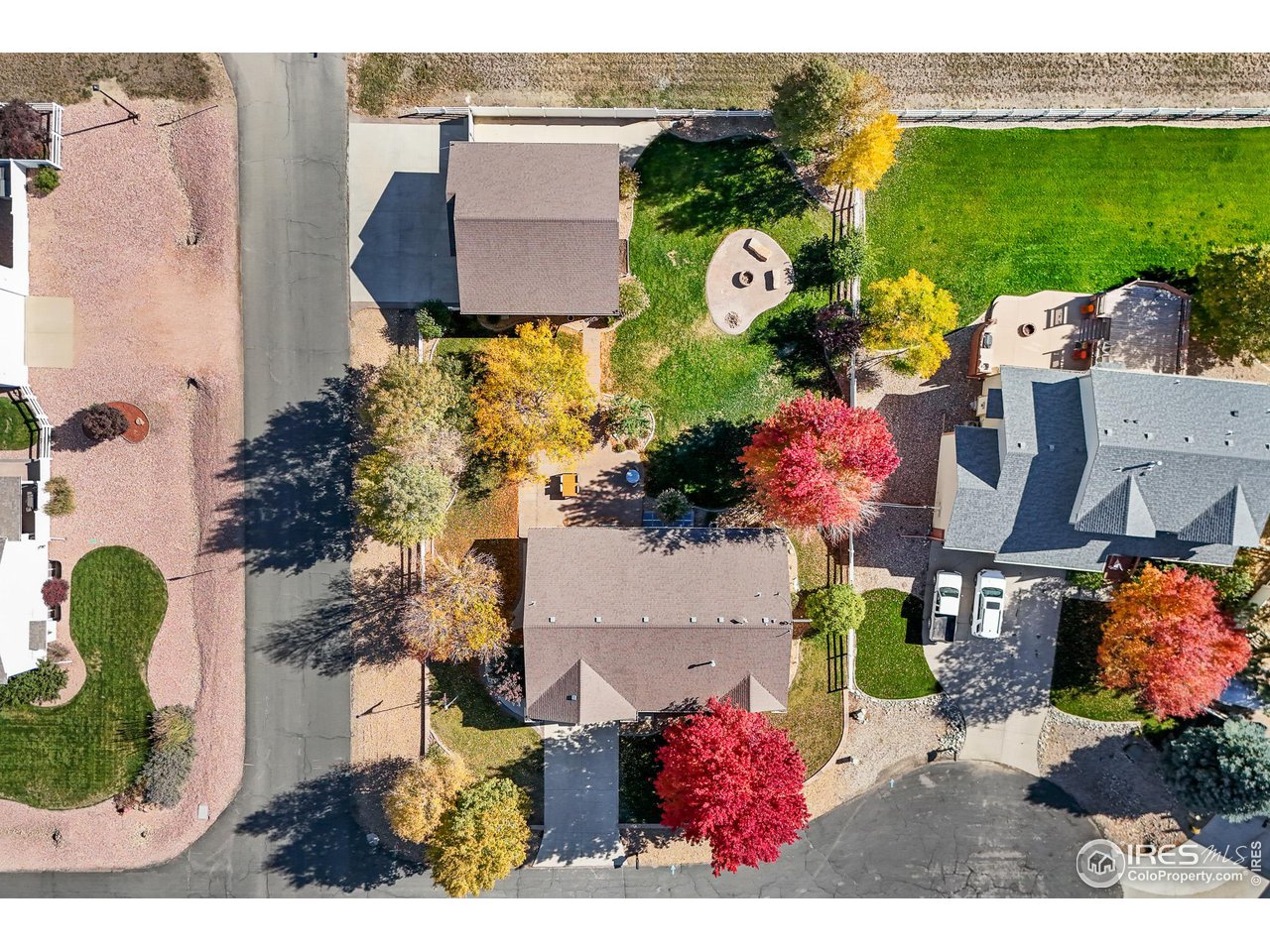 2002 Trail Ridge Drive Severance, CO 80615 - Photo 28 of 38 an aerial view of house with yard swimming pool and outdoor seating