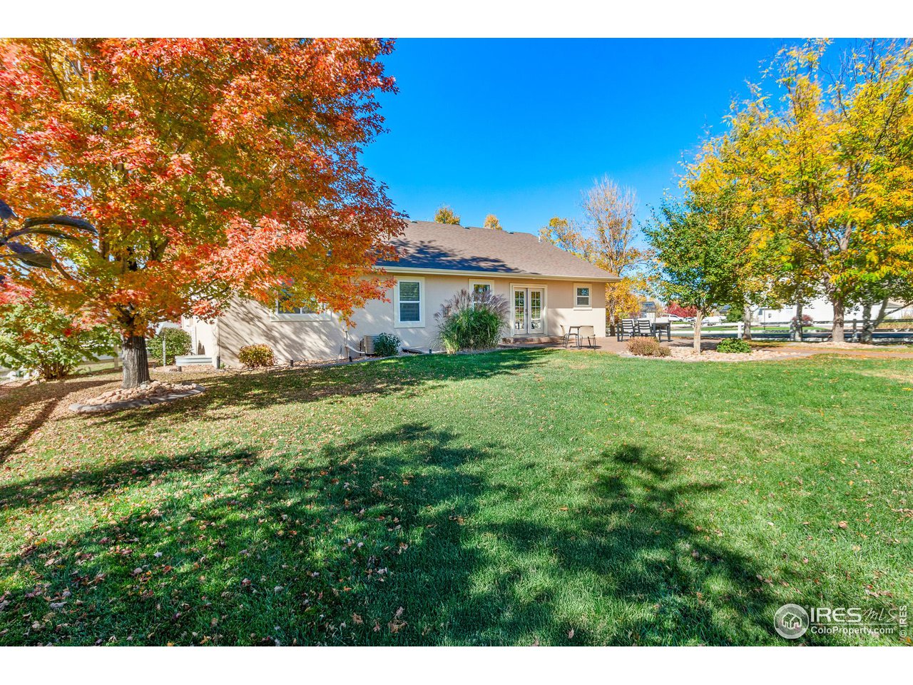 2002 Trail Ridge Drive Severance, CO 80615 - Photo 31 of 38 a view of a house with a big yard