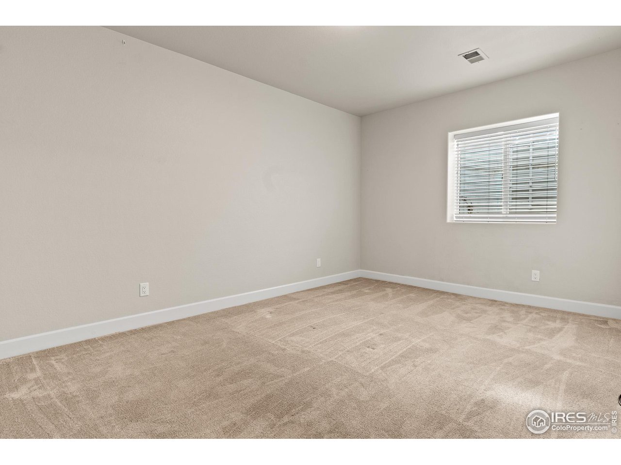 2002 Trail Ridge Drive Severance, CO 80615 - Photo 37 of 38 a view of an empty room and window