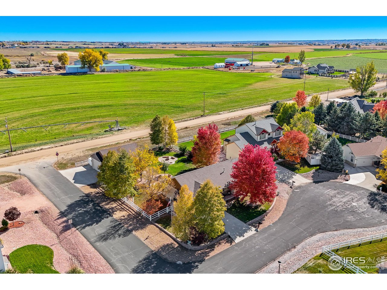 2002 Trail Ridge Drive Severance, CO 80615 - Photo 5 of 38 a view of a lake with a building in the back