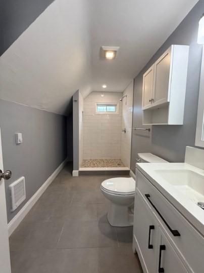5 Alcott Street, Unit 2 Boston, MA 02134 - Photo 14 of 14 a bathroom with a sink a toilet and shower