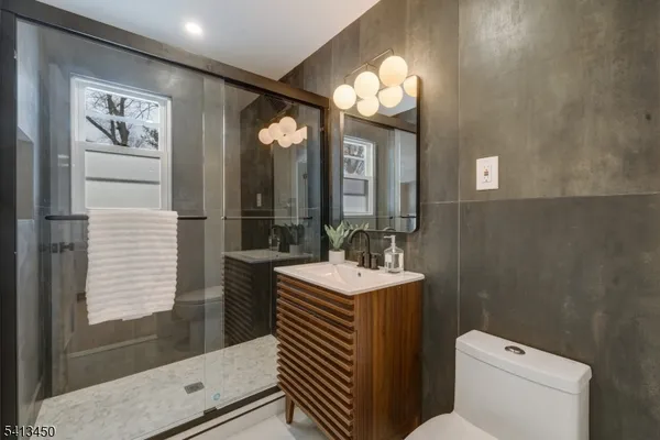 a bathroom with a sink and mirror